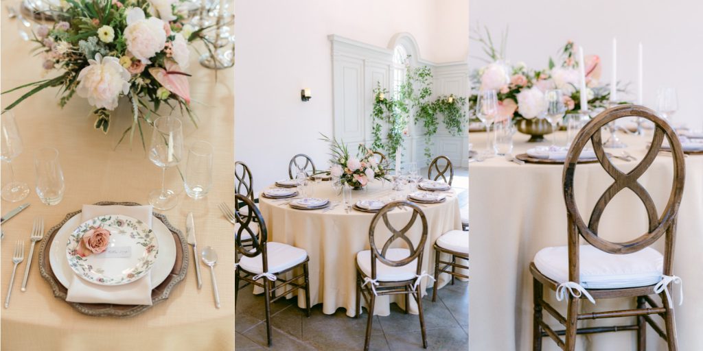 wedding reception tablescape with dark wood chairs and yellow tablecloth