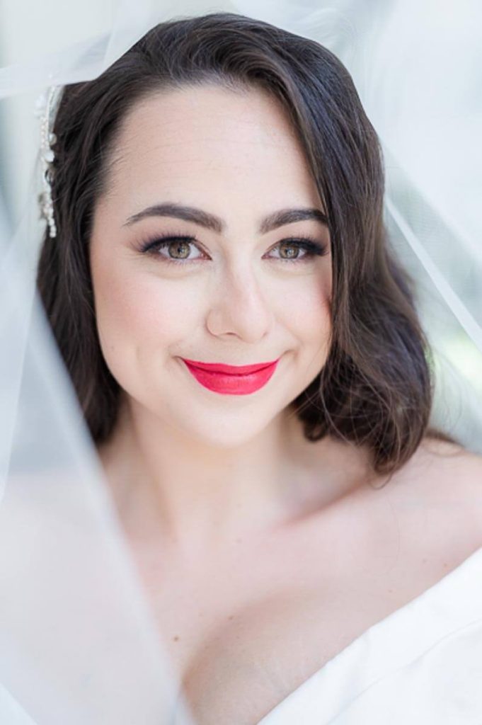 Close up bridal portrait surrounded by veil
