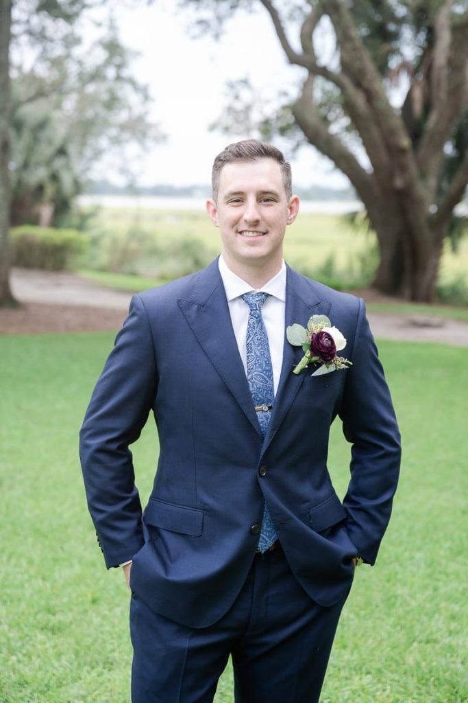 Groom portrait outside at Lowndes Grove