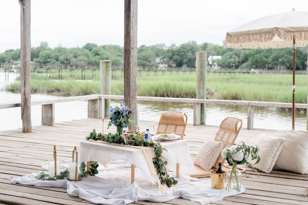 Proposal picnic set up on Cotton Dock at Boone Hall