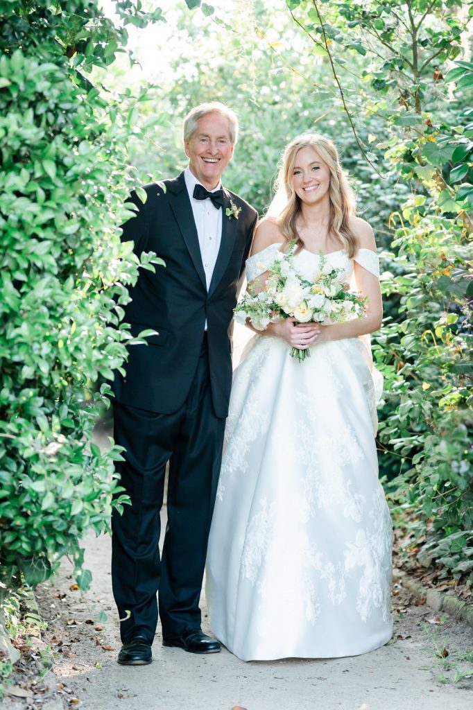 bride and father about ready to walk down wedding aisle