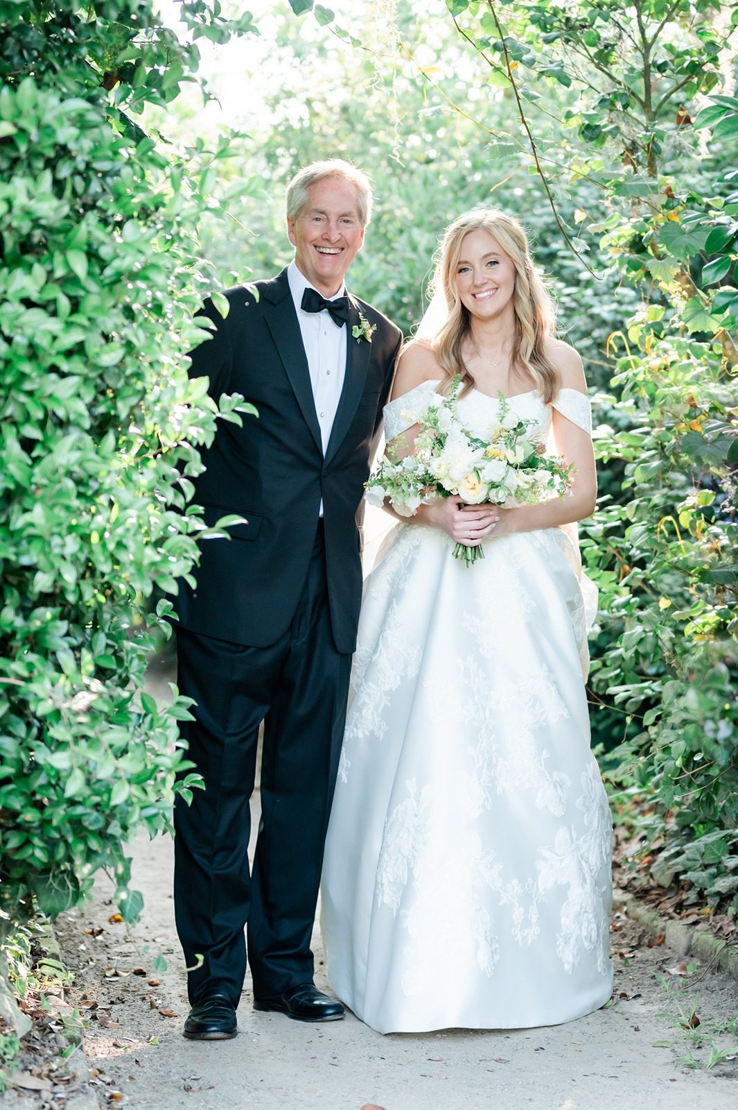 bride and father about ready to walk down wedding aisle