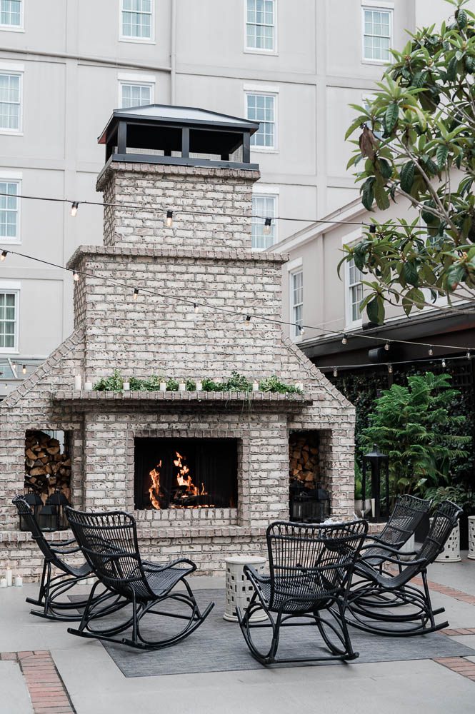 Fireplace in courtyard of Hotel Emeline