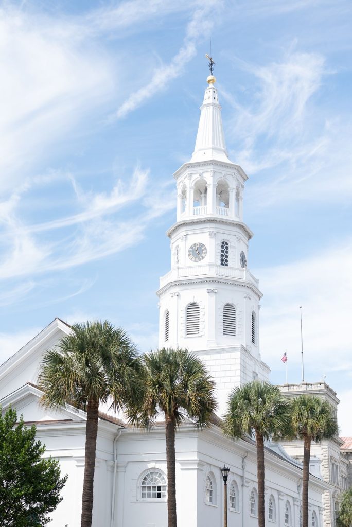 white church steeple and blue sky