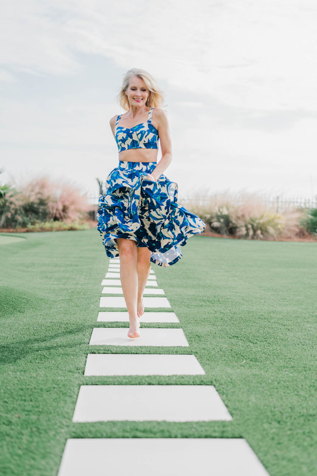 older model runs down path of concrete pavers